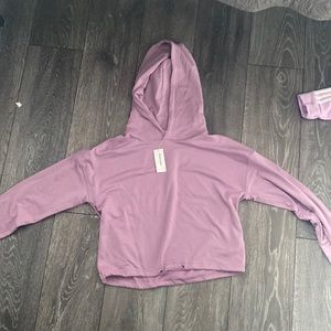 This is a cropped hoodie from Bluenotes! Brand new with tags and never worn!